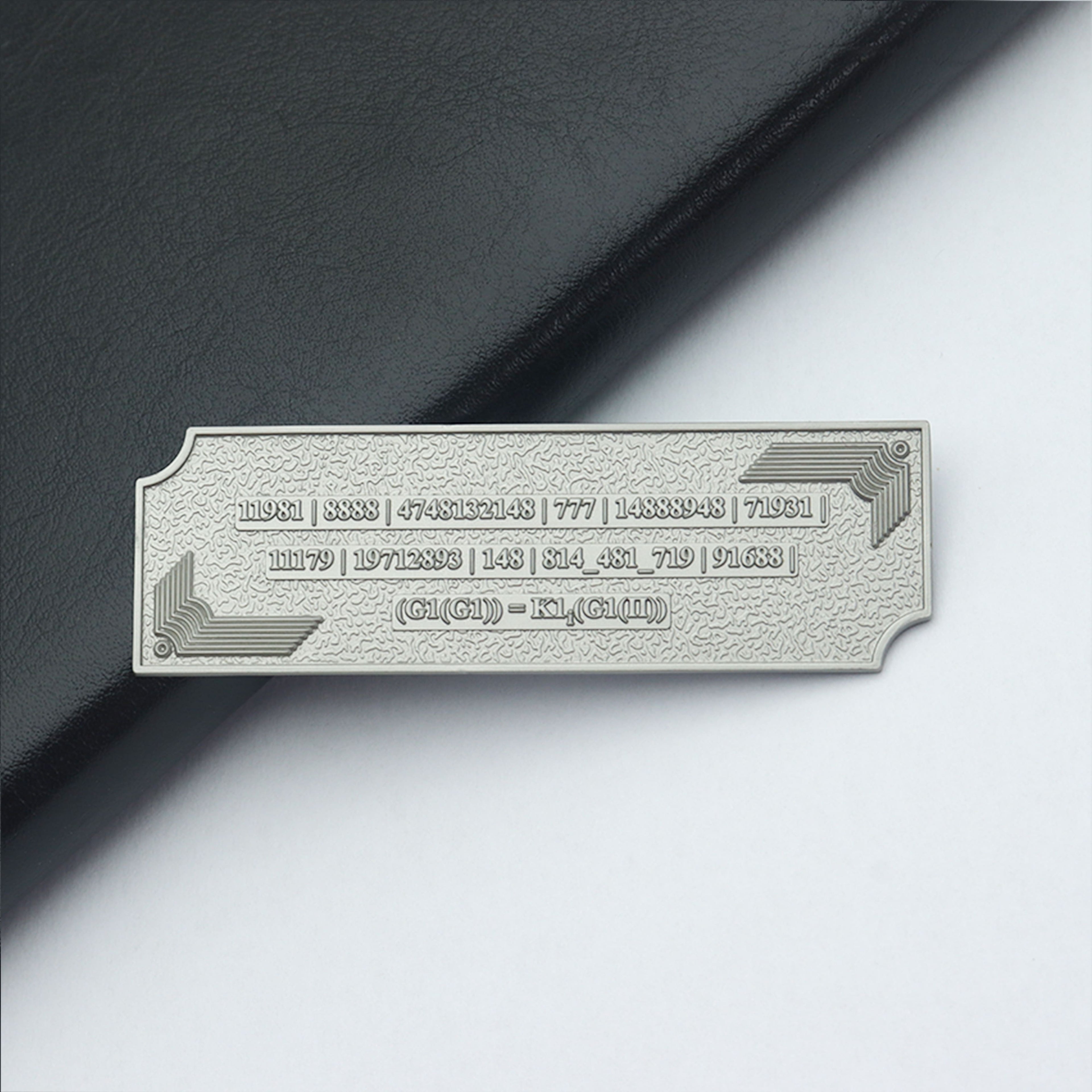 Metallic Grabovoi number charm for vehicles, designed to enhance protection, remove obstacles, and harmonize travel energy