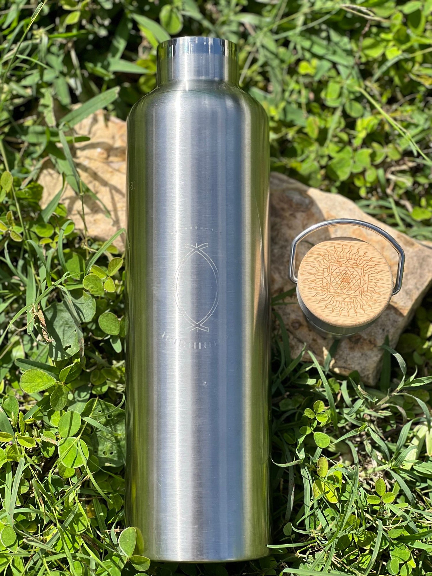 1L silver stainless steel Grabovoi bottle with engraved energy codes to transform water and support vibrational healing.